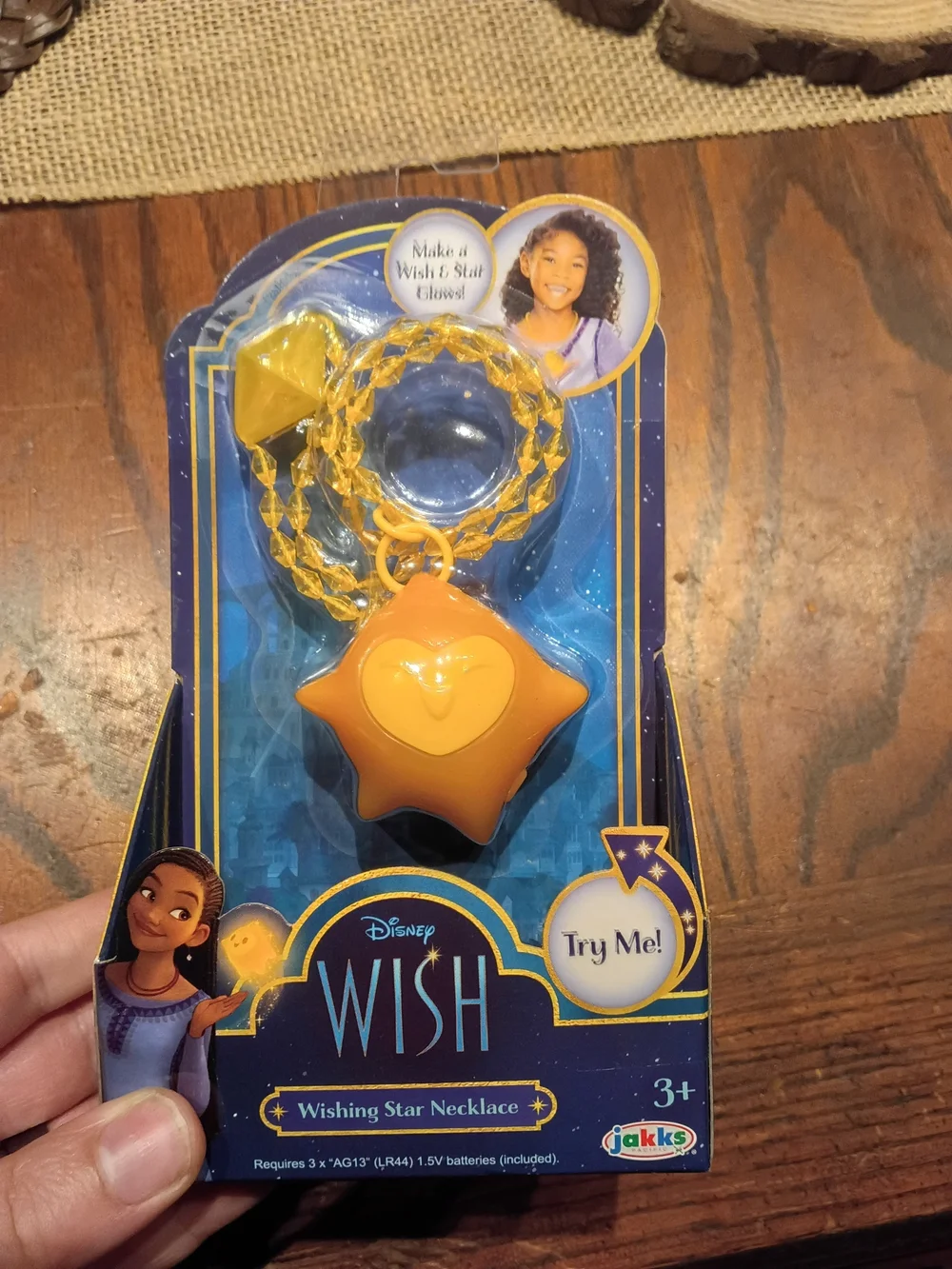 Disney Wish Light-Up Star Necklace in Yellow and Purple Packaging